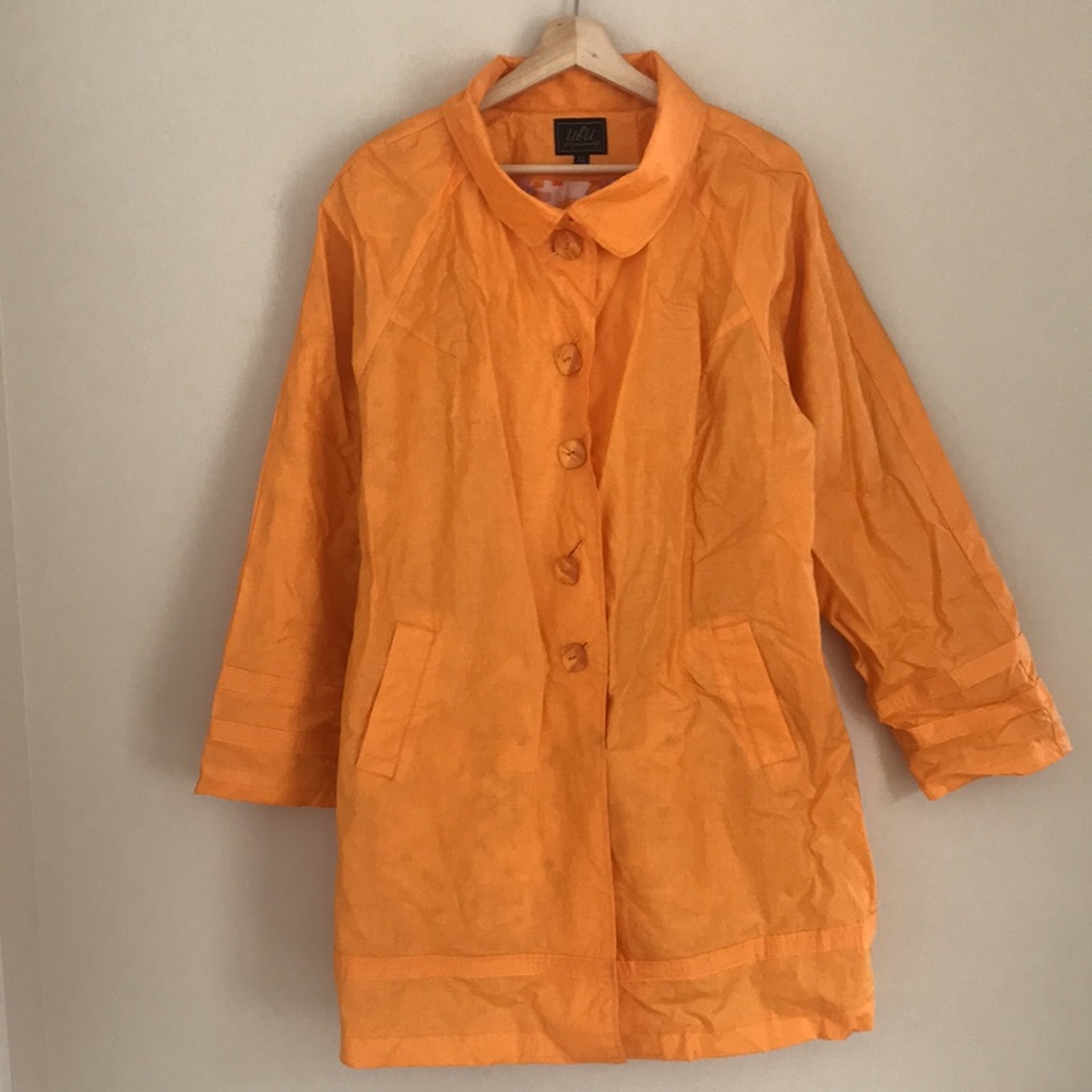 Bright orange 60s mod raincoat